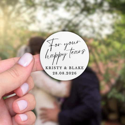 For your happy tears, round sticker held n a hand