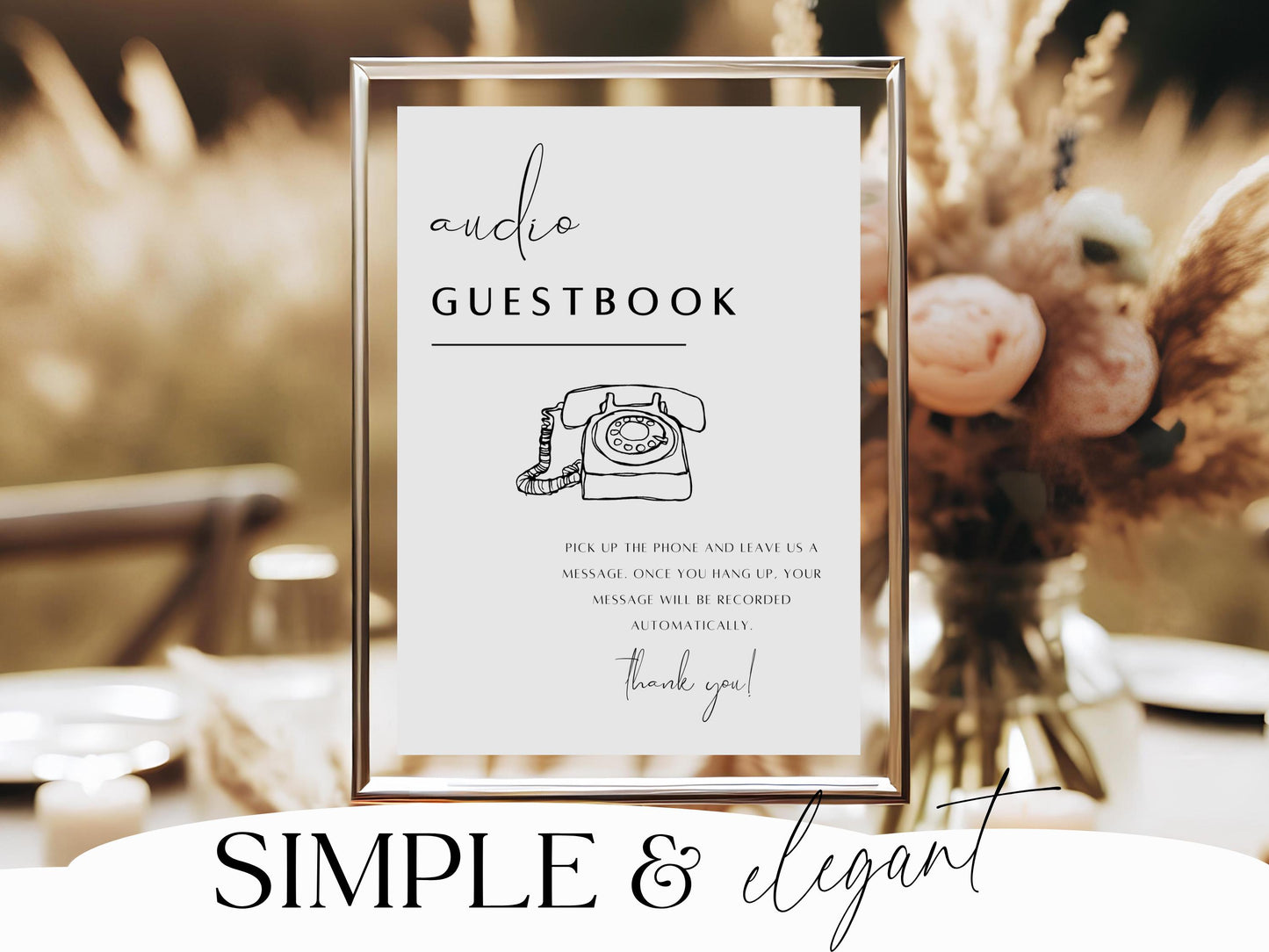 Guestbook sign with vintage phone illustration in a gold frame, blurred background