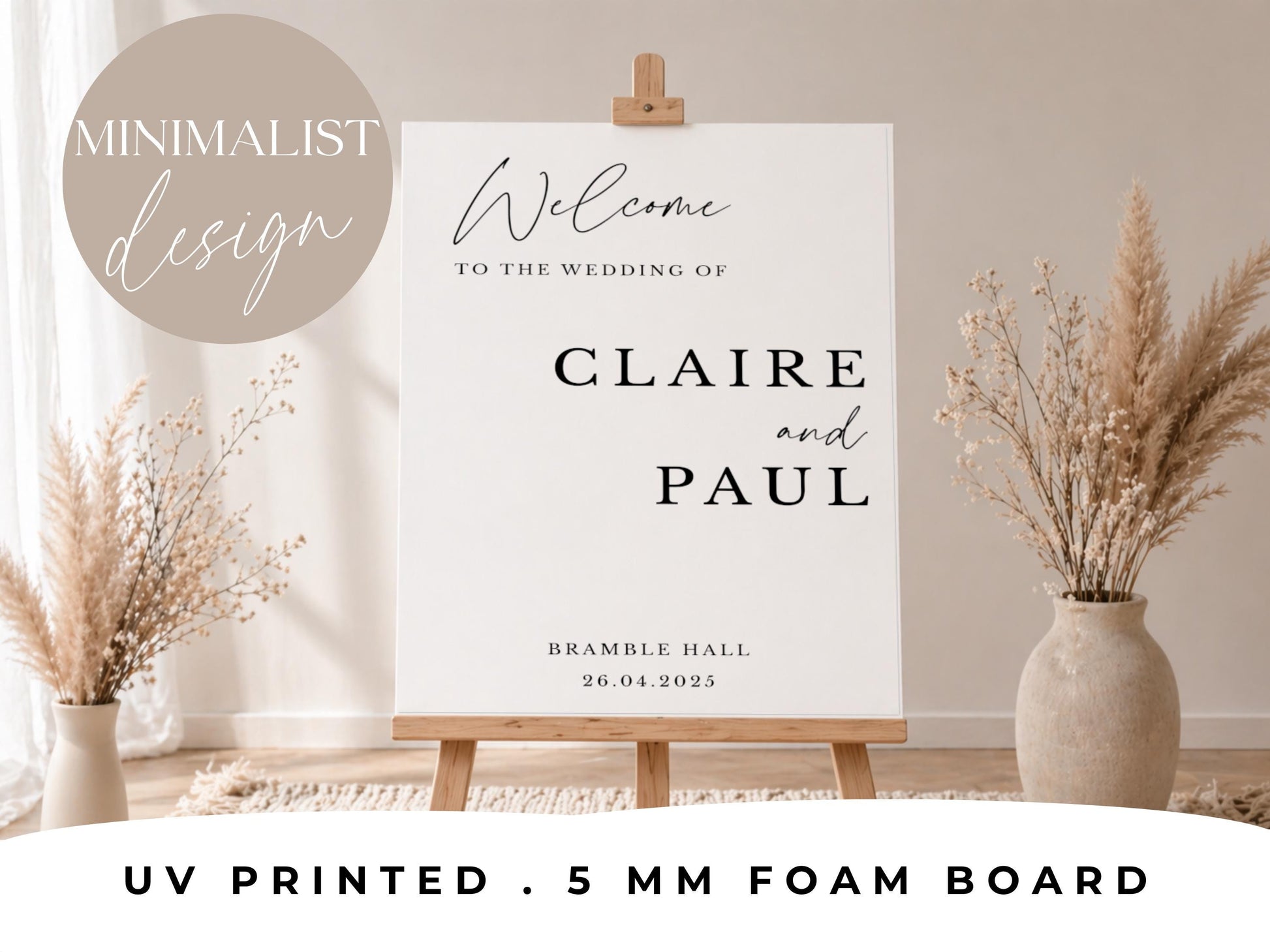 Minimalist boho wedding welcome sign with dried floral arrangements on each side