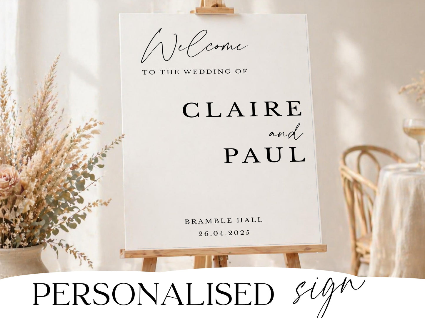 Personalised wedding welcome sign in modern script with dried florals on a wooden easel