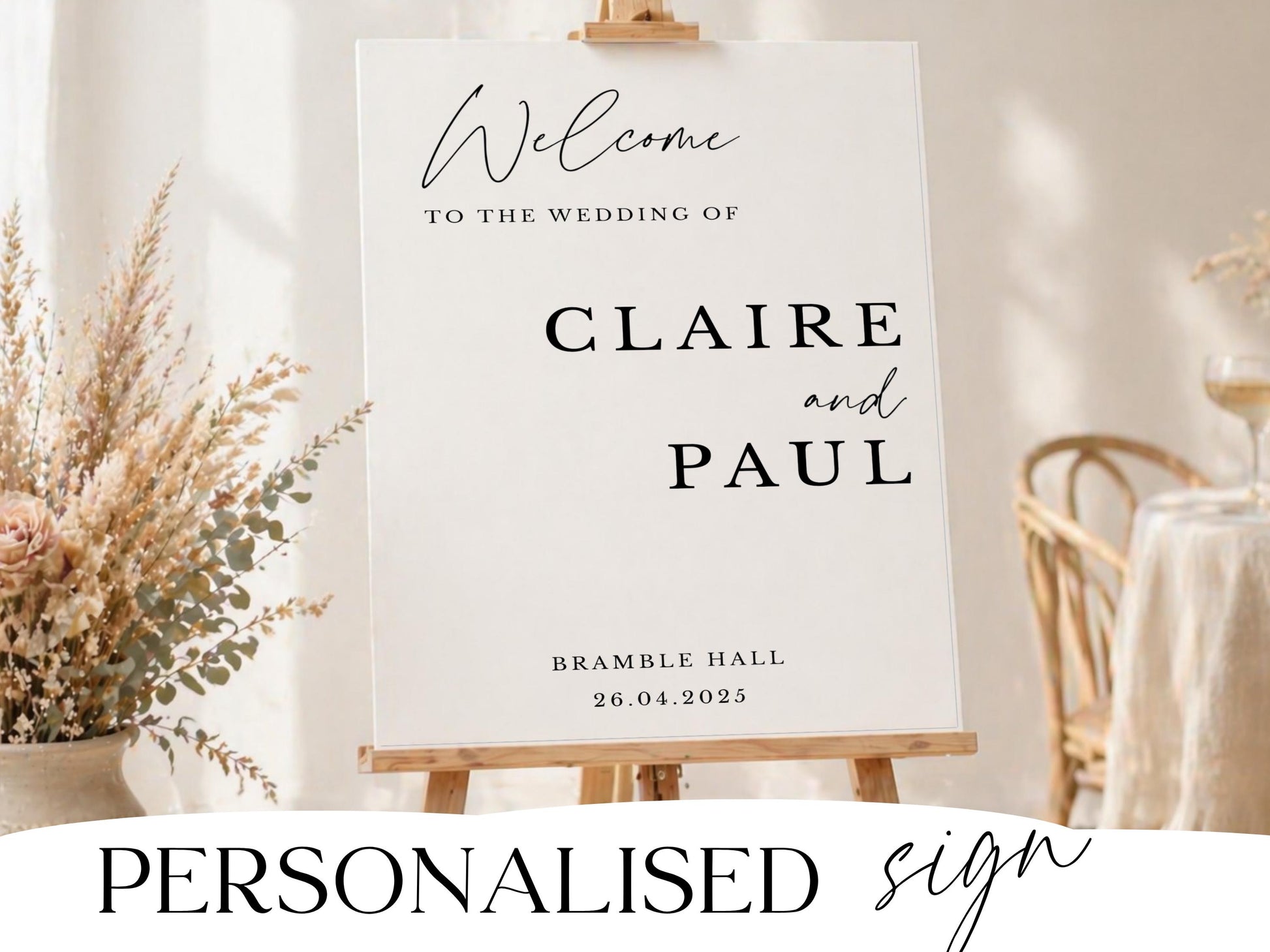 Personalised wedding welcome sign in modern script with dried florals on a wooden easel