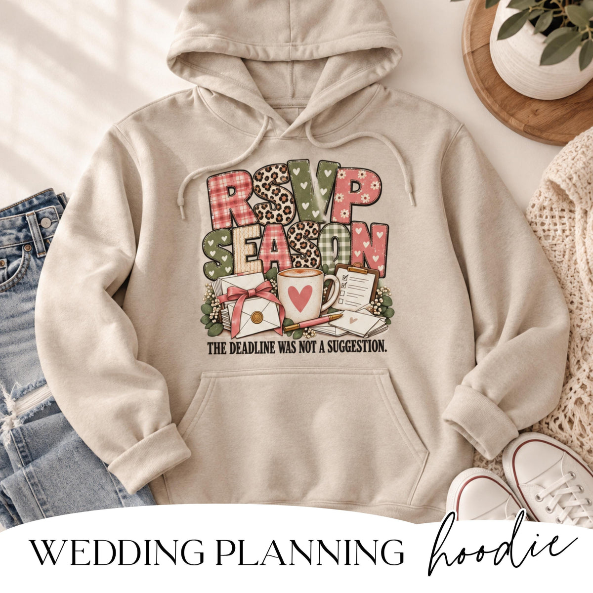 Bride to be wearing RSVP Season wedding planning hoodie