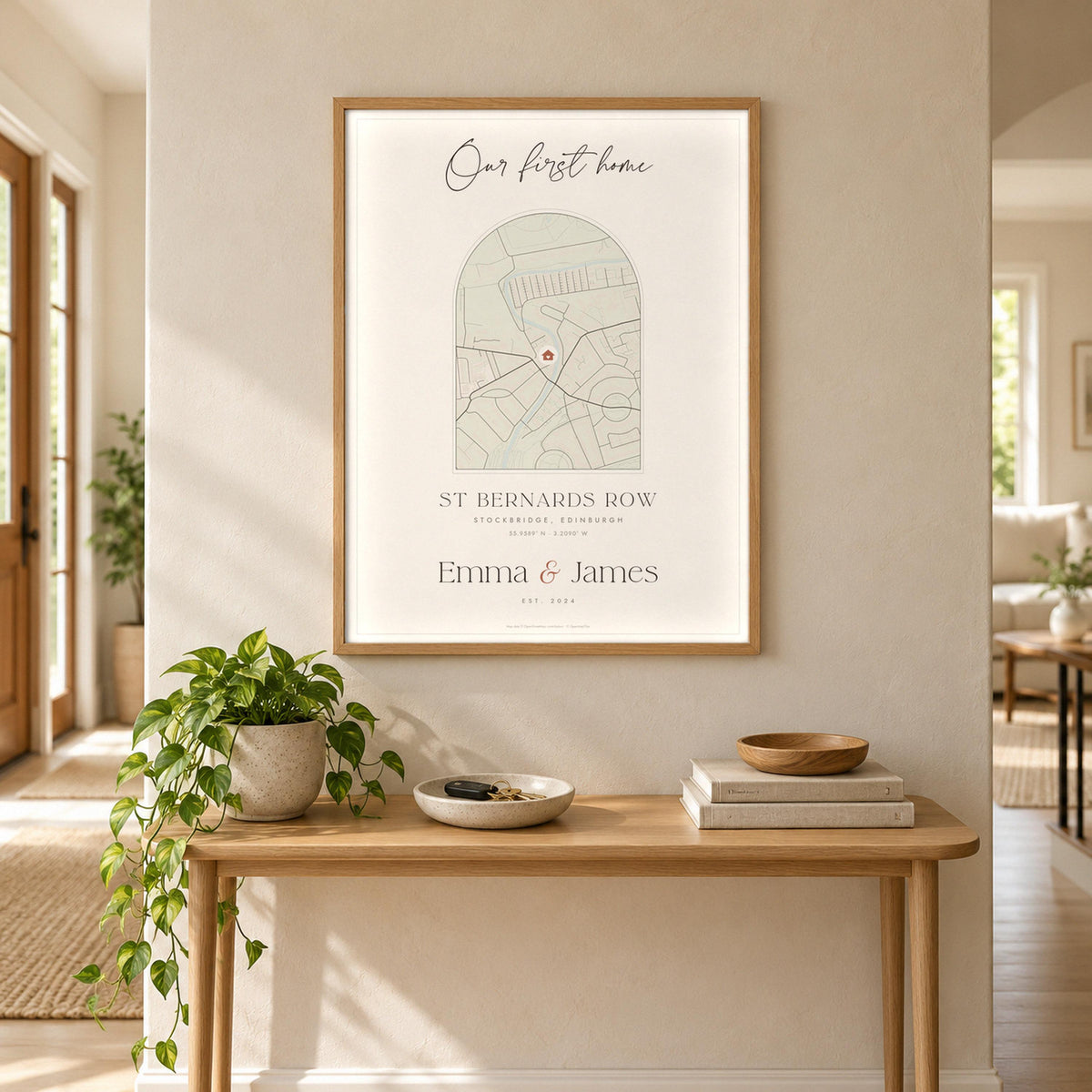 First home street map print framed in a hallway