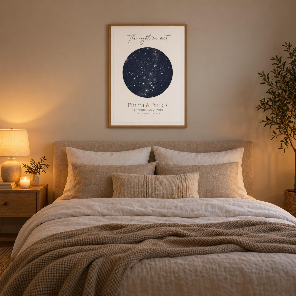 Night sky star map print framed above a bed
